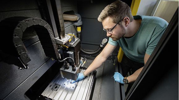 A technician at Saarland University working on a laser interference project. 