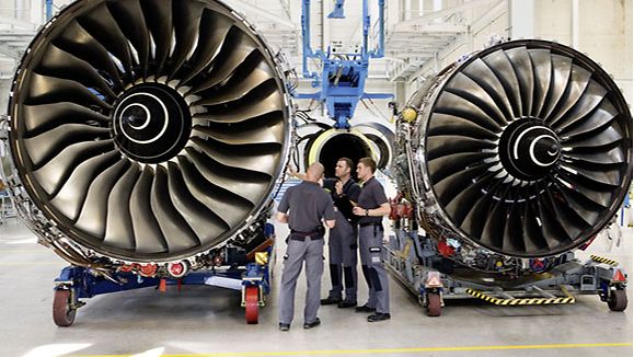 Technicians work on an aircraft engine at N3 Engine Overhaul Services on the Erfurter Kreuz industrial estate, Thuringia. 