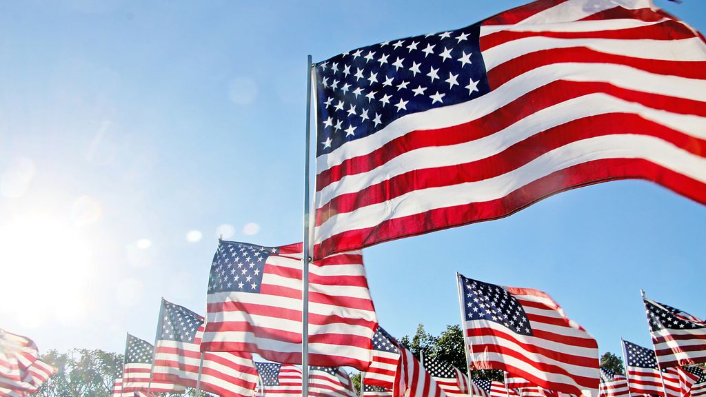 United States flags blow in the wind in Malibu, CA