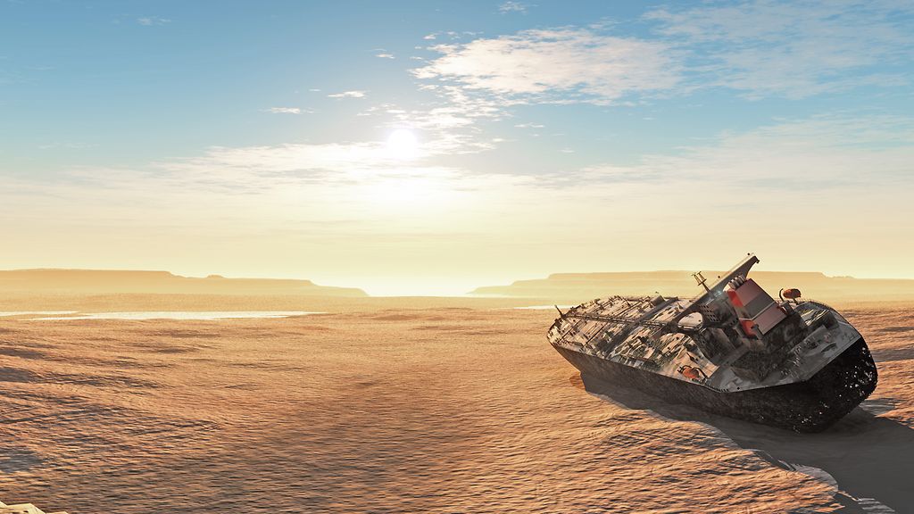 Rusty the oil tanker and the old station in the desert.